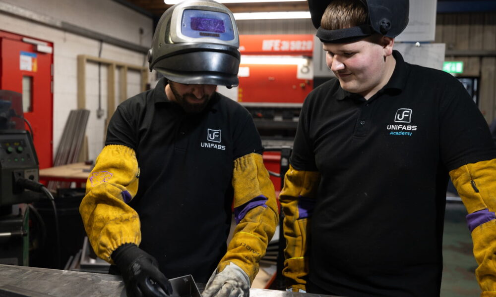 Unifabs Academy supervisor checks welding performed by apprentice