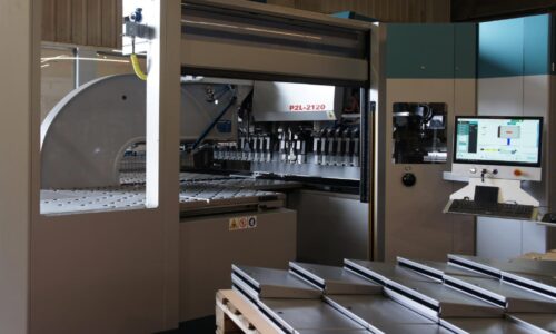 Unifabs metal forming services with advanced Salvagnini panel bending machine and sheet metal formed parts