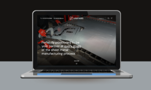 Unifabs website homepage featured on a laptop screen on a black and grey background