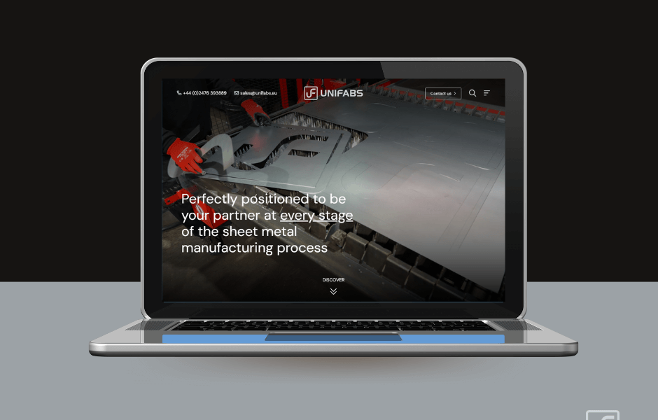 Unifabs website homepage featured on a laptop screen on a black and grey background