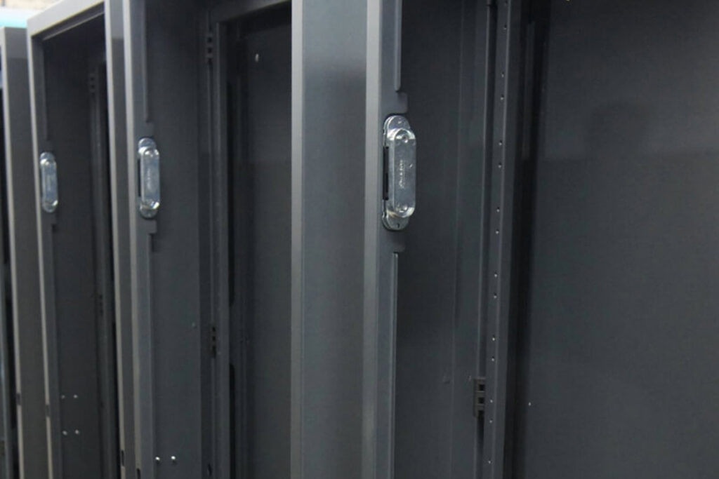 Sheet metal fabrication in locker manufacturing example of powder coated panels assembled into locker carcasses  