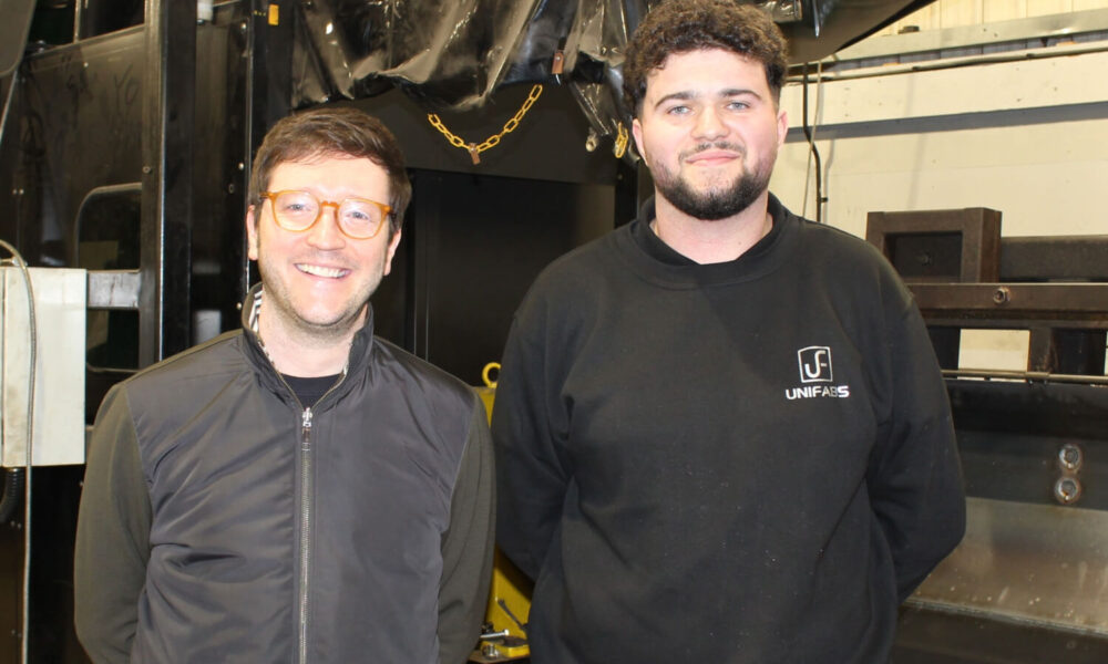 Matt Grealy, Unifabs Technical Director with Samuel Bough Metal Fabricator Apprentice in the robot welding area at Unifabs