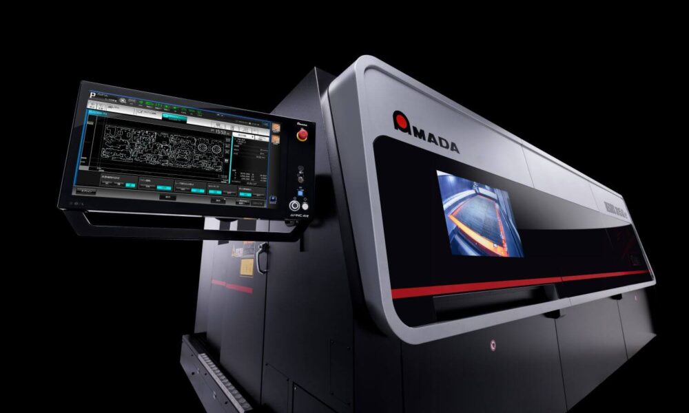 AMADA REGIUS-3015AJe fibre laser cutting machine on a black background