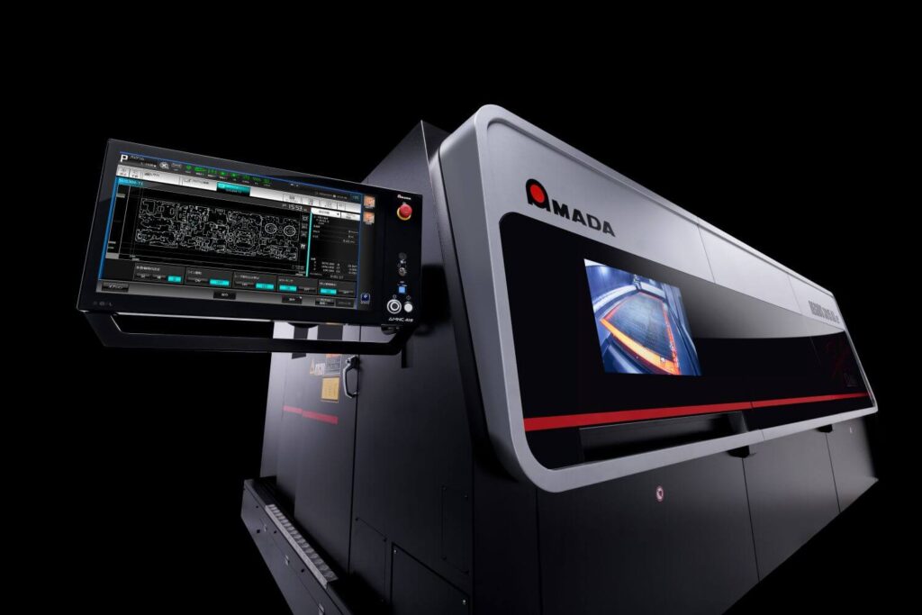 AMADA REGIUS-3015AJe fibre laser cutting machine on a black background